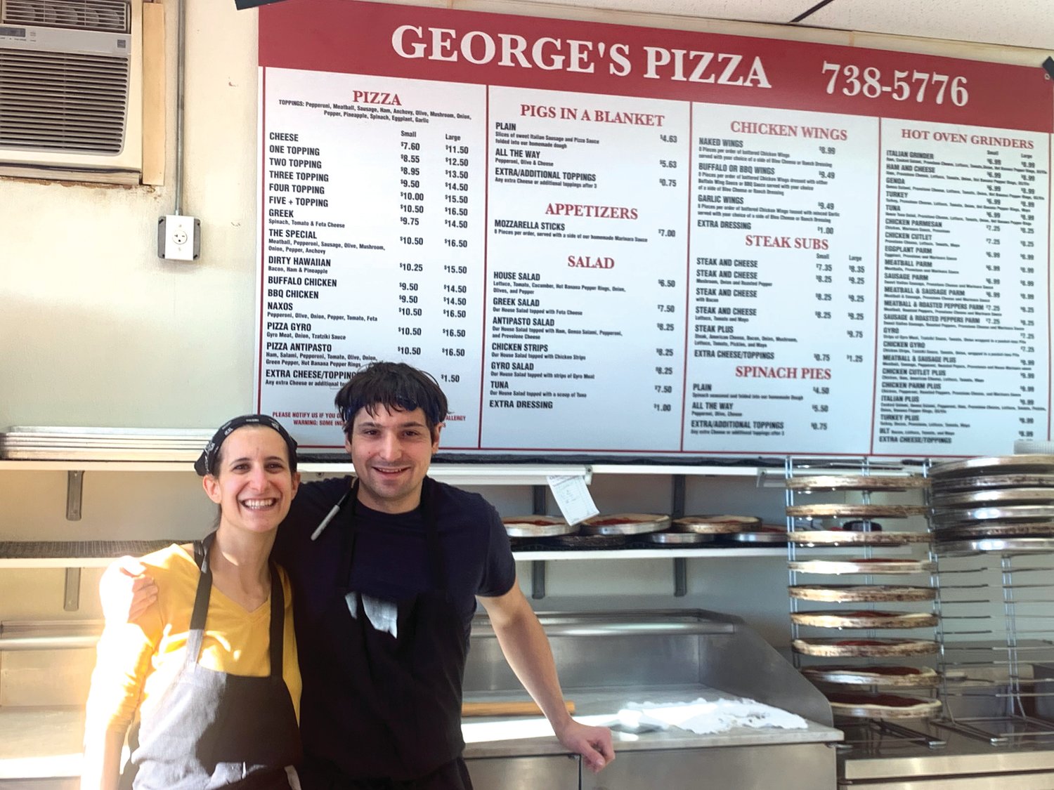 DOORS OPEN: Angela Degaitas and Kevin Jacob are the new owners of George’s Pizza after purchasing
the restaurant in December.